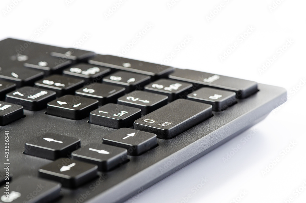 Computer keyboard on a white background. Copy space Computer keyboard on a white background. Copy space