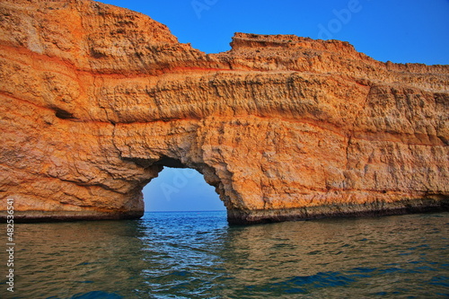 View through the hole in the rock during sunset