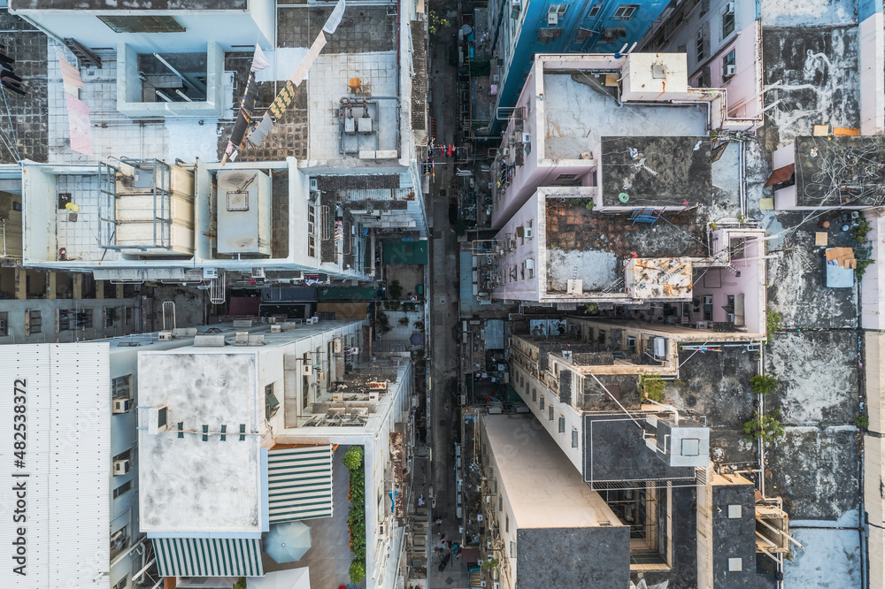 Amazing top view of messy rooftop of old residence building in Hong Kong