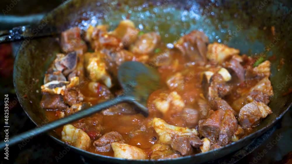 Traditional karahi of mutton at charsi tikka shop, Peshawar, Pakistan Traditional karahi of mutton at charsi tikka shop, Peshawar, Pakistan