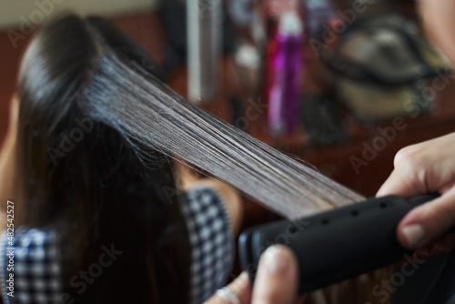 long hair of the girl on which the corrugation device passes
