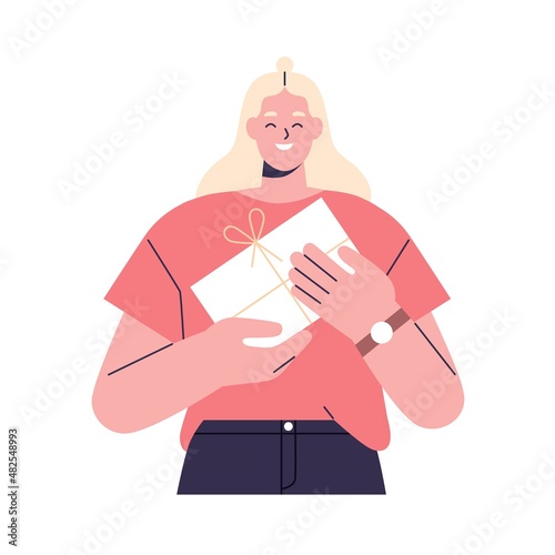 Happy woman with gift box in hands. Smiling person holding received present f...