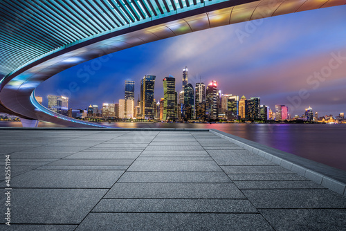 Panoramic skyline and modern commercial buildings with empty square floor in Shanghai, China. empty floor and cityscape.