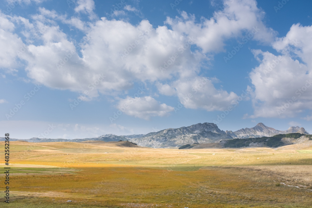 Curvy hills and Blue sky and. Beautiful plain. Montenegro
