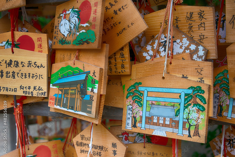 Naklejka premium Takaoka, Japan 01 Aug, 2017- A Japanese votive plaque(Ema) hanging in Imizu Shrine at Takaoka castle Park in Takaoka, Toyama, Japan. a famous historic site.