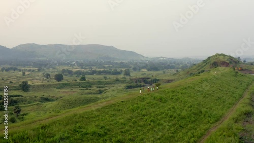 Locals Walking On The Scenic Landscape Of Karjat In India - aerial drone shot photo