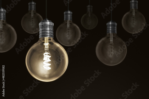Idea , bulbs electric and a light as a concept of the new business ideas blue 