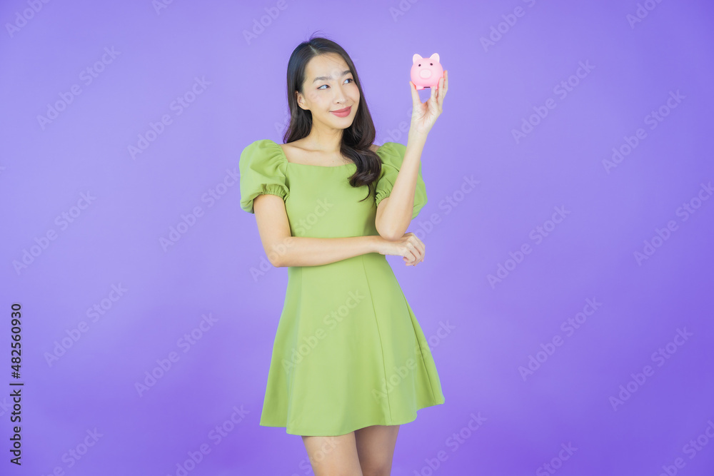 Portrait beautiful young asian woman with piggy bank Portrait beautiful young asian woman with piggy bank