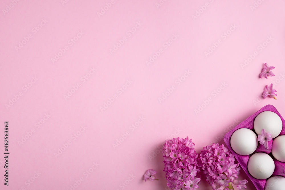 Natural pink hyacinths and white eggs on light pink background. Lovely Easter mockup. Spring flowers and chicken eggs composition. Festive holiday concept. Greeting card. Copy space, top view. Natural pink hyacinths and white eggs on light pink background. Lovely Easter mockup. Spring flowers and chicken eggs composition. Festive holiday concept. Greeting card. Copy space, top view.
