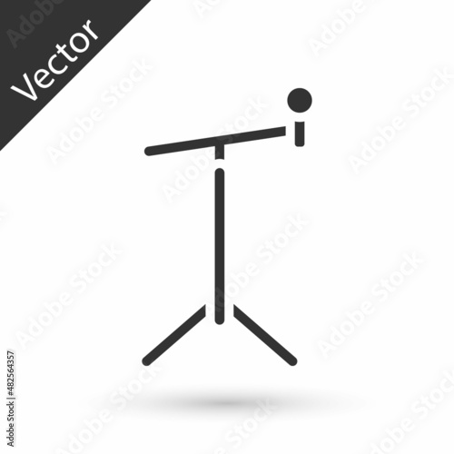 Grey Microphone with stand icon isolated on white background. Vector