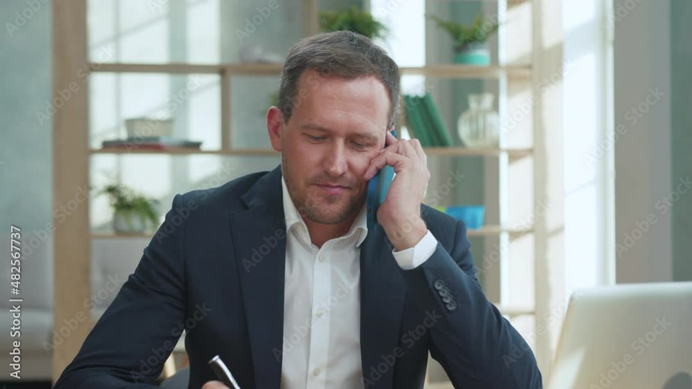 Handsome Smiling Man Talking Phone in Office Close up. Portrait Caucasian Businessman Worker with Consulting Chat in Mobile Phone. Professional Occupation Salesman for People. Busy Millennial Calling Handsome Smiling Man Talking Phone in Office Close up. Portrait Caucasian Businessman Worker with Consulting Chat in Mobile Phone. Professional Occupation Salesman for People. Busy Millennial Calling