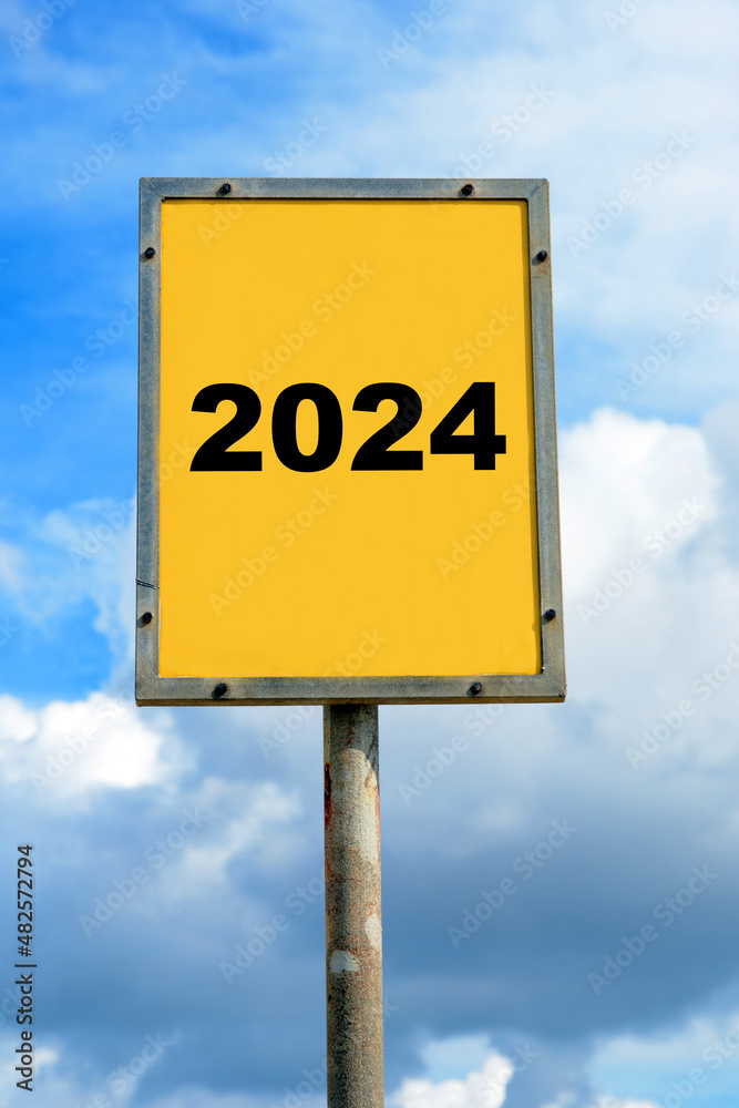 Sign with blue sky showing a date of 2024