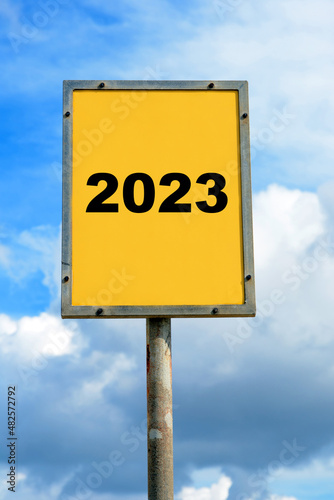 Sign with blue sky showing a date of 2023