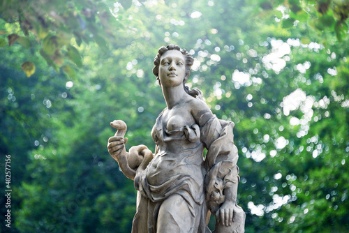 Sandstone statues in the Saxon Garden, Warsaw, Poland. Made before 1745 by anonymous Warsaw sculptor under the direction of Johann Georg Plersch. Statues of Greek mythical muses photo