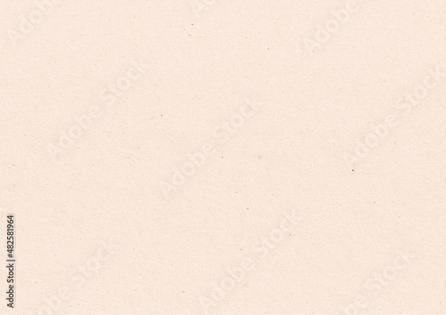 Rectangular beige craft paper background with rough texture. Blank backdrop with copy space for text. Cardboard sheet, recycled paper to create natural ecological zero waste design
