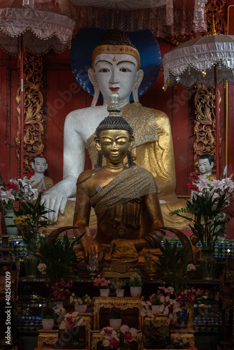 Beautiful Shan style Buddha subduing Mara statues in vihara at ancient Wat Pa Pao buddhist temple, Chiang Mai, Thailand