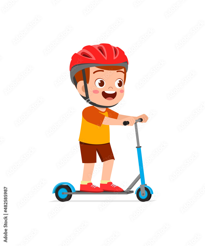 cute little boy riding scooter and wear helmet cute little boy riding scooter and wear helmet