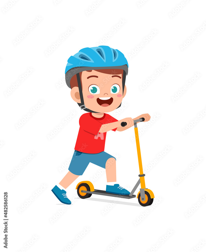 cute little boy riding scooter and wear helmet