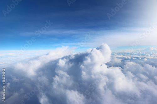 Clouds seen from the plane nature blue sky background sunshine 