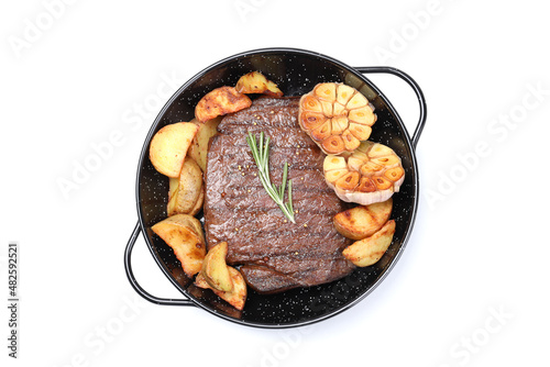Plate with beef steak, potato and garlic isolated on white background