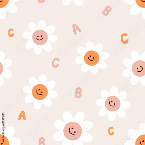 Seamless pattern with daisy flower cartoons and hand written alphabet on cream background. Nursery wallpaper or textile vector.
