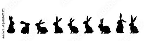 Stampa su tela Silhouettes of Easter bunnies isolated on a white background