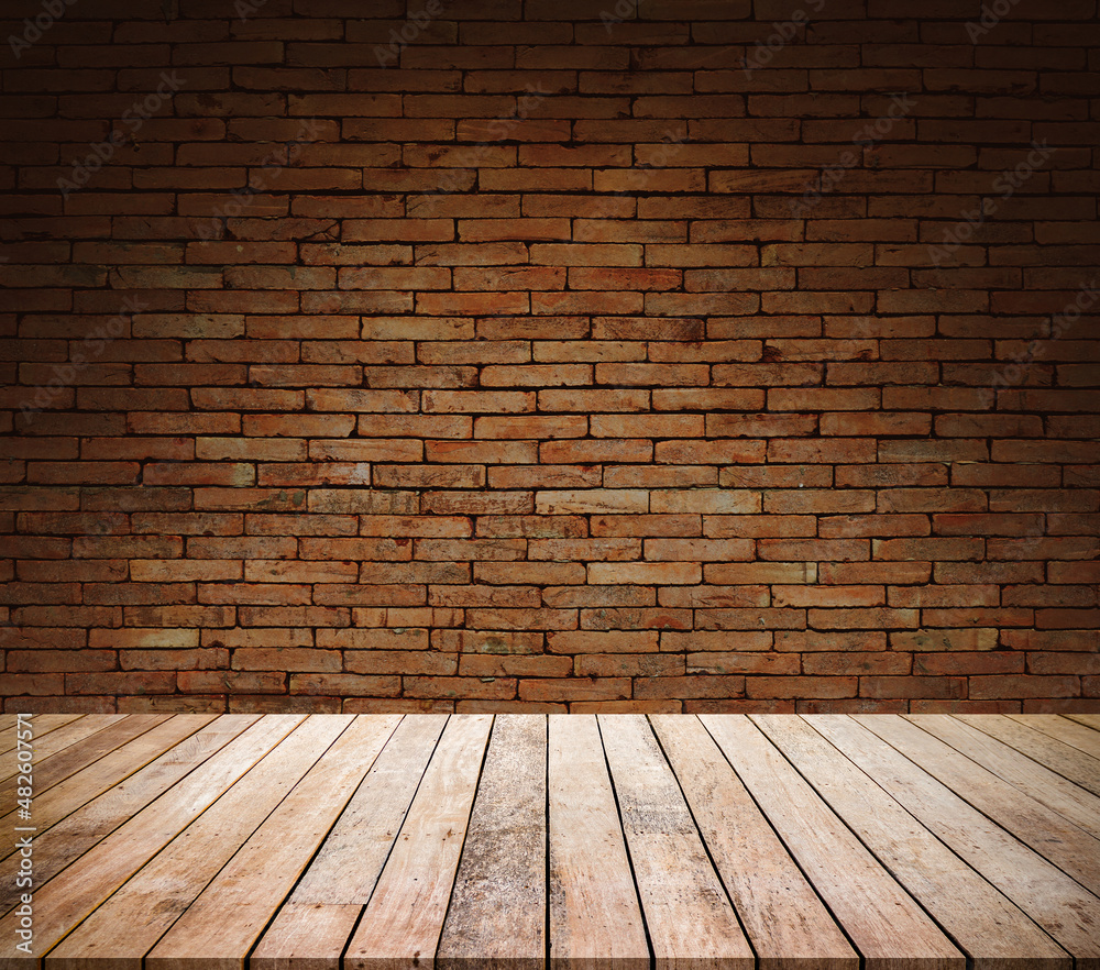 Old wood table with abstract old brick wall with light background for product display