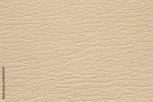 Cream color background from leather sheet texture 