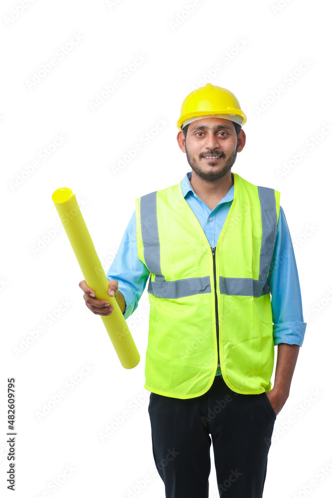 Young architect man with helmet and holding blueprints in hand. on white background.