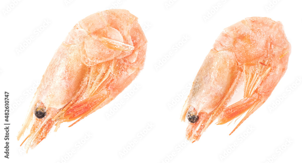 Unpeeled frozen shrimp on a white background. close-up Unpeeled frozen shrimp on a white background. close-up