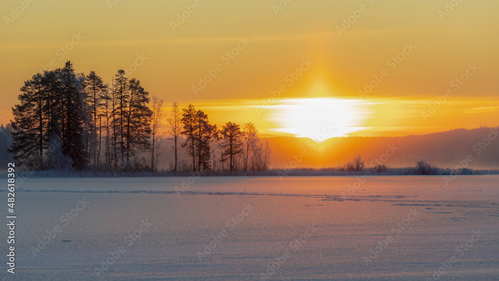 Winter sunrise at the frozen lake Winter sunrise at the frozen lake