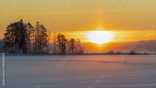 Winter sunrise at the frozen lake © Tuomo