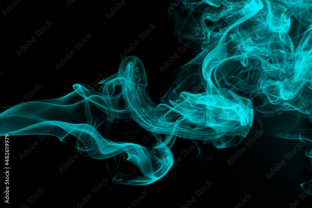 Beautiful Blue smoke on black background for design. darkness concept