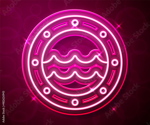 Glowing neon line Ship porthole with rivets and seascape outside icon isolated on red background. Vector