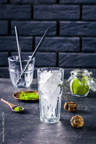 a glass with ice cubes, top view