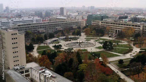 Moving aerial shot of Freedom Square in Bratislava, Slovakia on overcast day photo