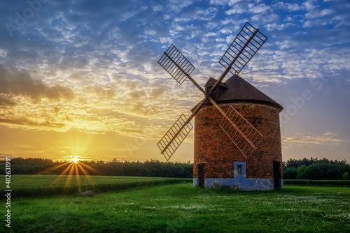 old windmill at sunrise in the Moravian village of Chvalkovice