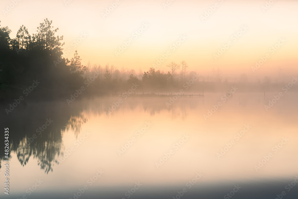 Obraz premium beautiful nature outdoor landscape scenery background. sunset and fog at hill in wonderland travel on vacation.