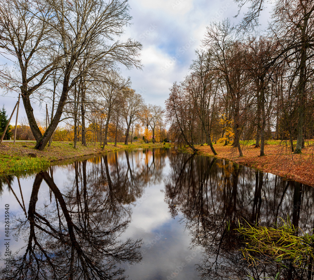 Fototapeta premium Autumn view of a park of the historical Astravas manor in Birzai, Lithuania