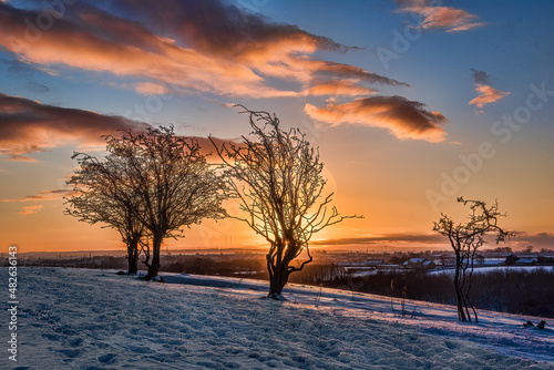 Snow covered fields and snow at sunrise in central Scotland. 