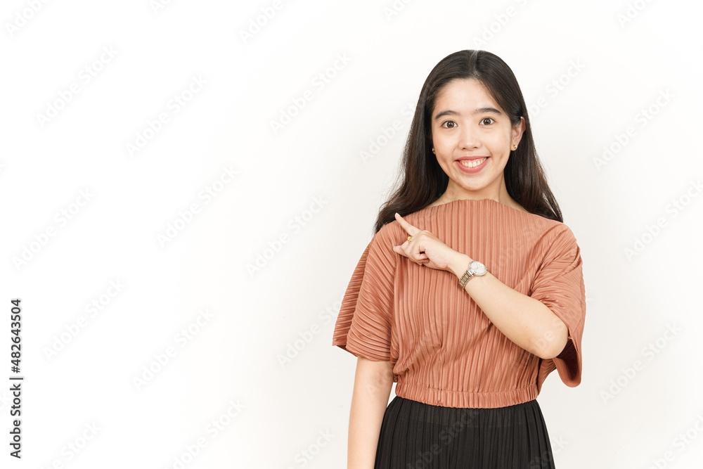 Pointing Product On The Side Of Beautiful Asian Woman Isolated On White Background Pointing Product On The Side Of Beautiful Asian Woman Isolated On White Background