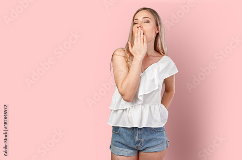 Young caucasian woman posing boredom isolated on color background © fotofabrika