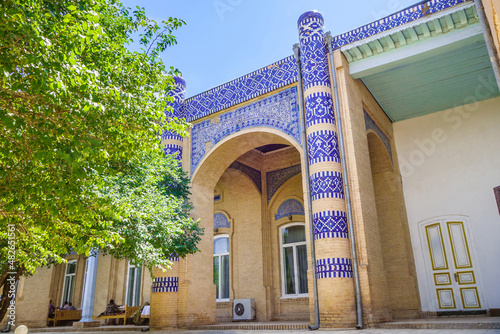 Street iwan or gallery in traditional style in the Qibla Tozabog summer palace of the khan, Khiva, Uzbekistan. Attraction of Dishan-Kala (historical 