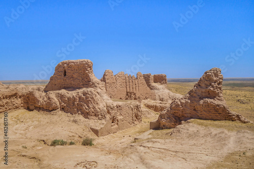 Remains of the gate of the desert fortress Ayaz-Kala. The fortification was built in the 3-4th century BC. The Kyzyl Kum desert is visible in the distance. Shot in Karakalrakstan, Uzbekistan