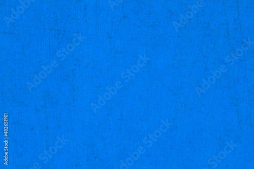 Blue cotton fabric. Blue background.