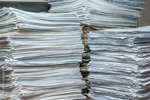 pile of paper documents in the office, paper trash, waste paper