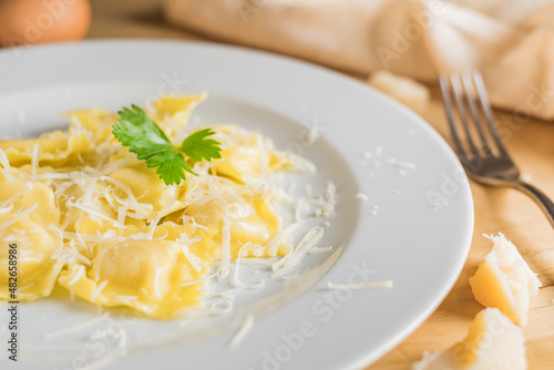 ravioli pasta on light plate. Italian food