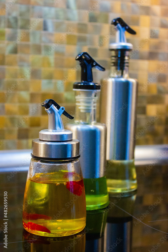 olive oil in a clear bottle olive oil in a clear bottle