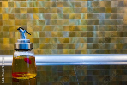 olive oil in a clear bottle