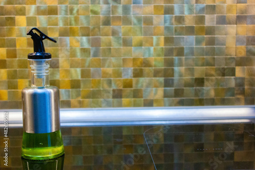 olive oil in a clear bottle